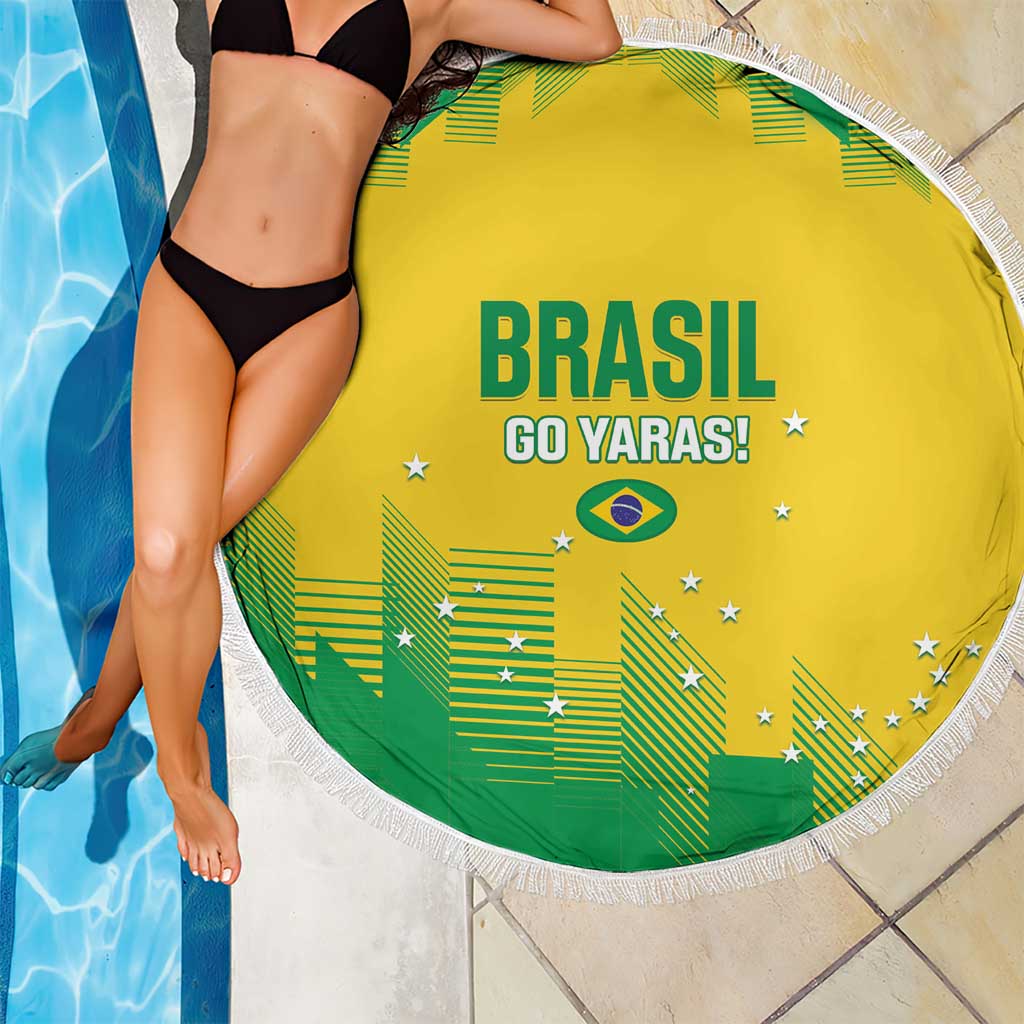 Yellow circular beach blanket with white tassel fringe, Brasil Go Yaras! graphic near pool