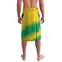 Yellow and green rugby shorts with number 14 print, back view