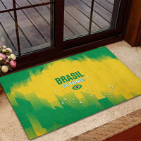 Rubber doormat outdoors with Brasil Go Yaras logo, green and yellow