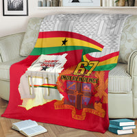 Red Ghana Independence blanket on couch, displaying Ghana flag, map, and “Independence 67”