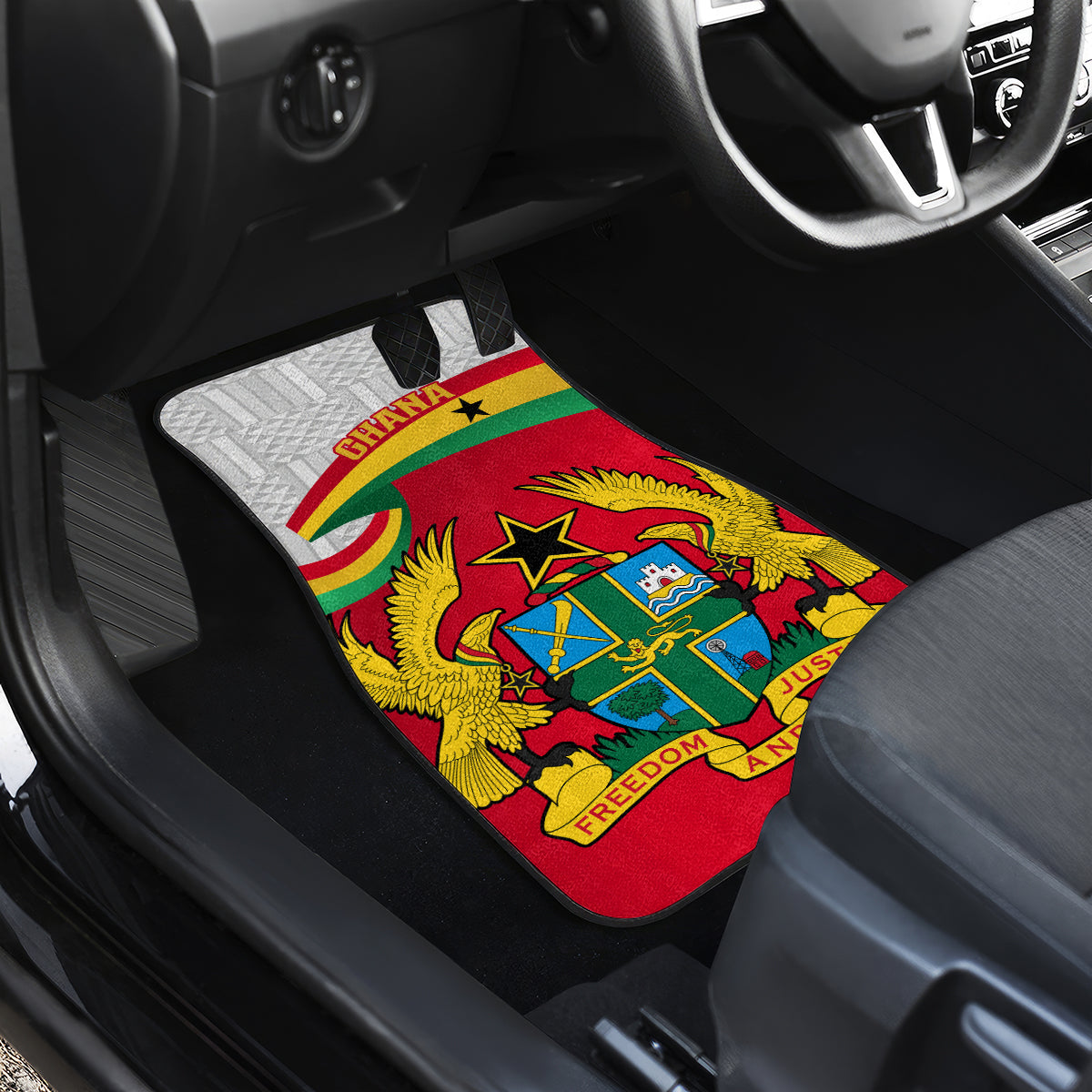 Red Ghana crest car floor mat on passenger seat with flag colors and stars