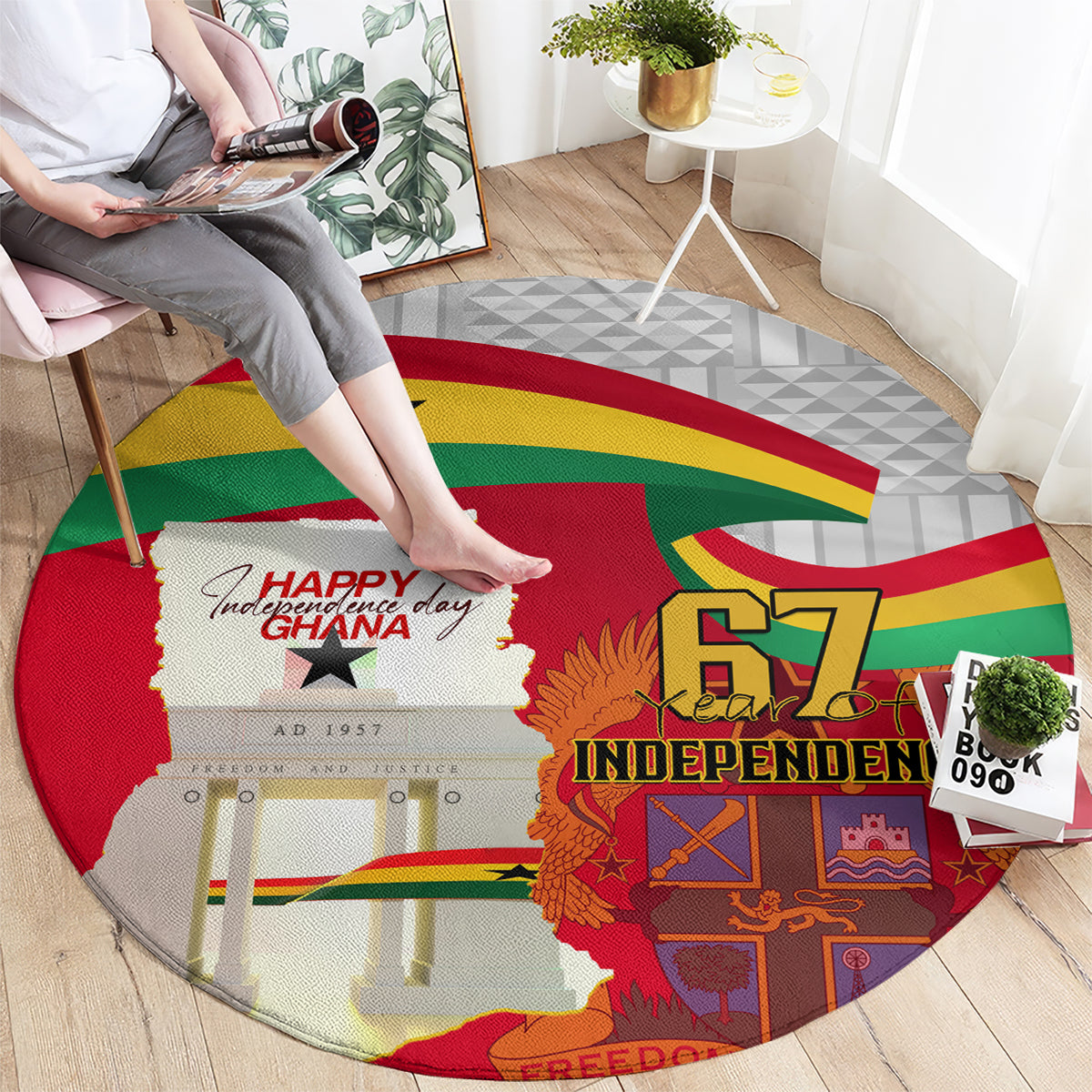 Red round carpet with Ghana flag colors, Ghana map, “Happy Ghana” and “Independence 67”