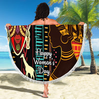Round beach blanket with fringe, African portrait pattern, "Happy Women’s Day" message.