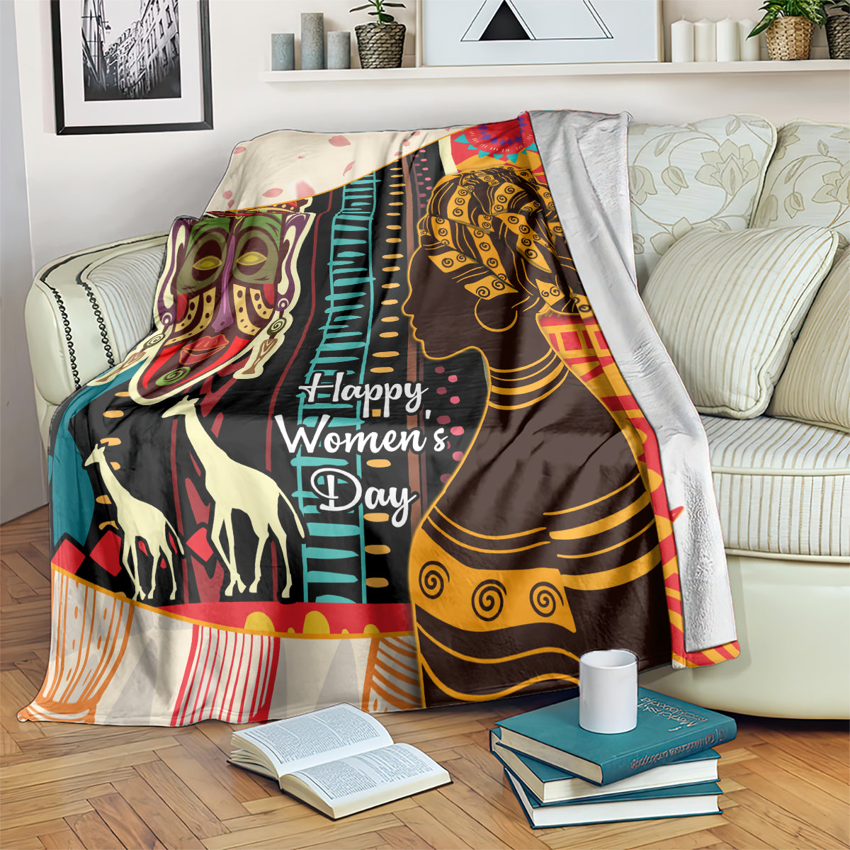 Women’s Day Africa throw blanket draped on a couch with illustrated faces and stripes