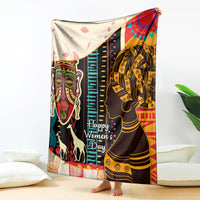 Africa pattern throw blanket with large women portraits and “Happy Women’s Day” text