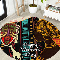 Round African-pattern carpet showing dark background with faces and “Happy Women’s Day”