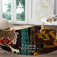 Round African-pattern carpet with colorful faces and “Happy Women’s Day” text