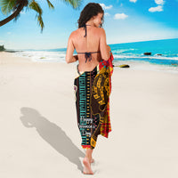 Women’s sarong with black, gold, red, and blue African pattern, “Happy Women’s Day”