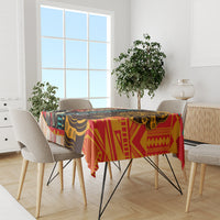 Multicolor African-pattern tablecloth on dining table in a bright room