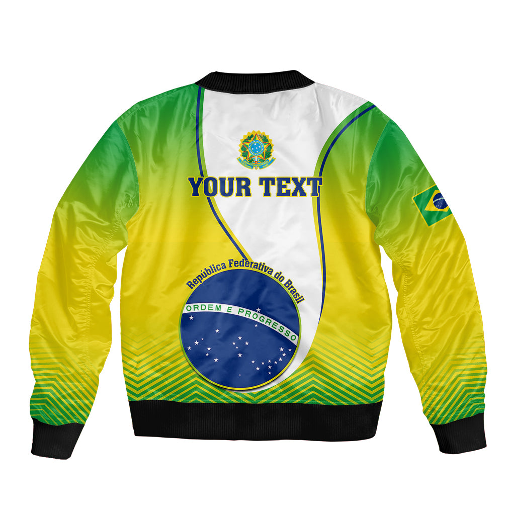 Green and yellow bomber jacket back with 'YOUR TEXT' print, crest patch, black ribbed hem
