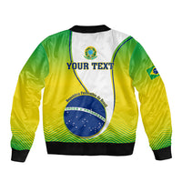 Green and yellow bomber jacket back with 'YOUR TEXT' print, crest patch, black ribbed hem
