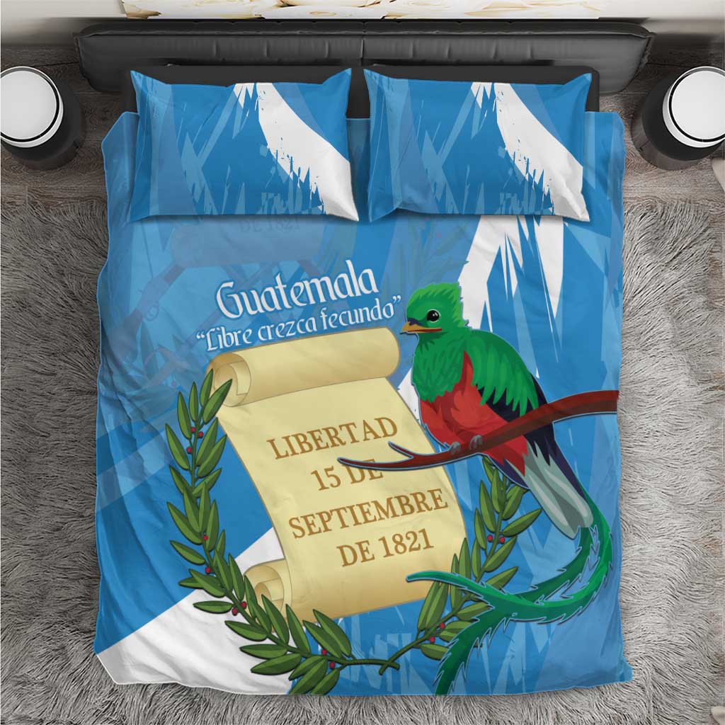 Blue Guatemala bedding set with quetzal bird, coat-of-arms scroll, and two pillowcases