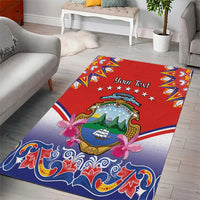 Red folk area rug with coat of arms, stars, and decorative border