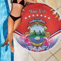 Red circular beach blanket with white fringe, Costa Rica crest, large pink blossoms, Your Text