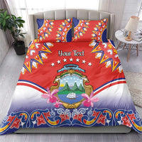 Red, blue and white duvet cover with pillow shams showing crest emblem and “Your Text”.