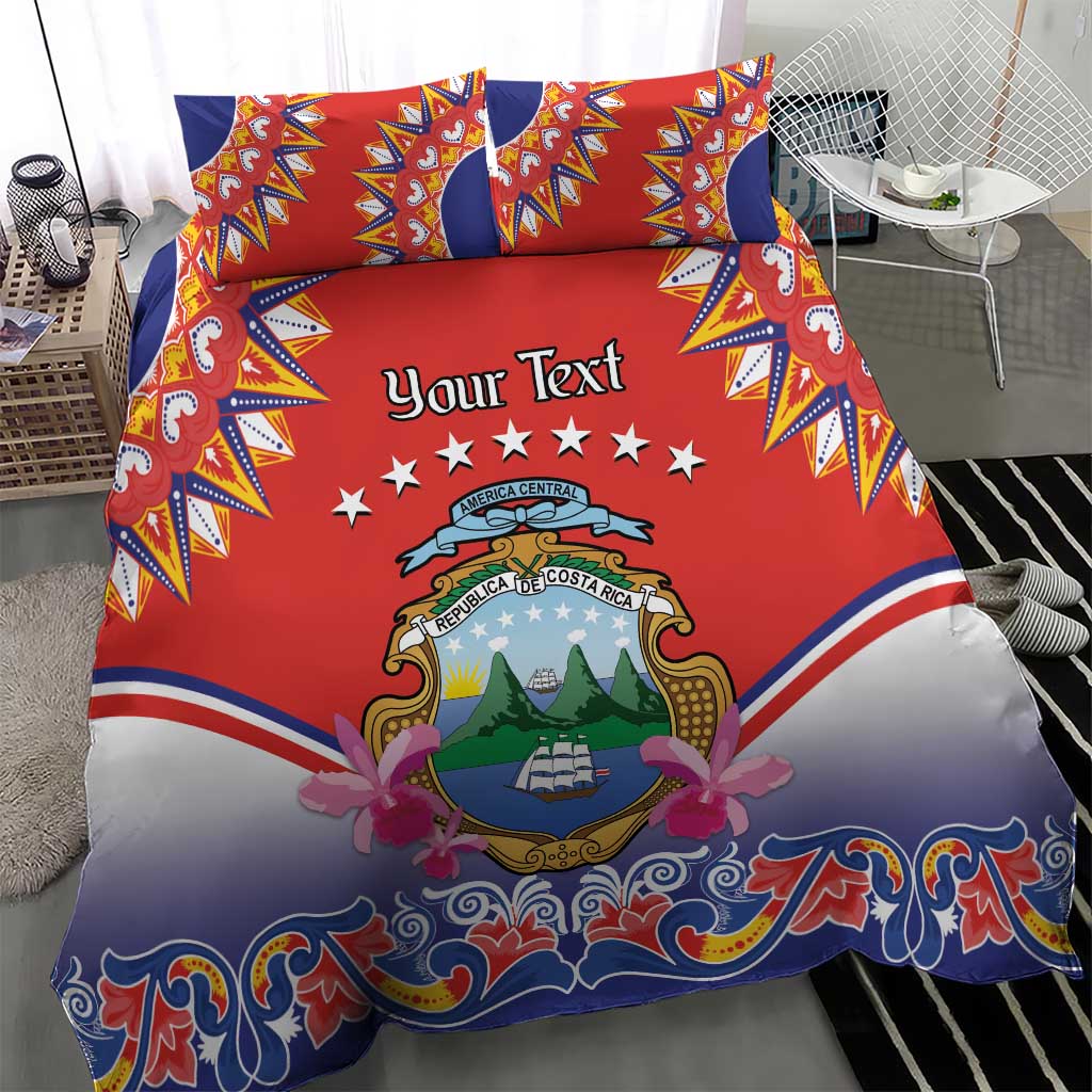 Red duvet cover and two pillow shams with “Your Text” crest, stars, and patterned borders.