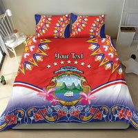 Red duvet cover with two matching pillow shams; “Your Text” crest and stars on center.