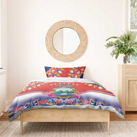 Red, blue, and white bedding set on a bed with crest emblem and “Your Text” center.