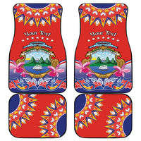 Red personalized car floor mat with folk border pattern, crest, and flower accents
