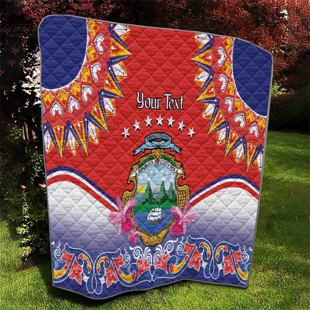 Personalized red quilt with navy corners and Costa Rica crest, stars above crest