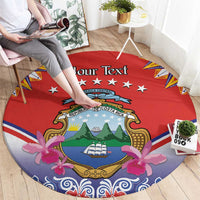 Round red rug with Costa Rica coat of arms, pink flowers, and “Your Text”