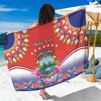 Red folk-pattern sarong with personalized text and Costa Rica crest, floral trim.