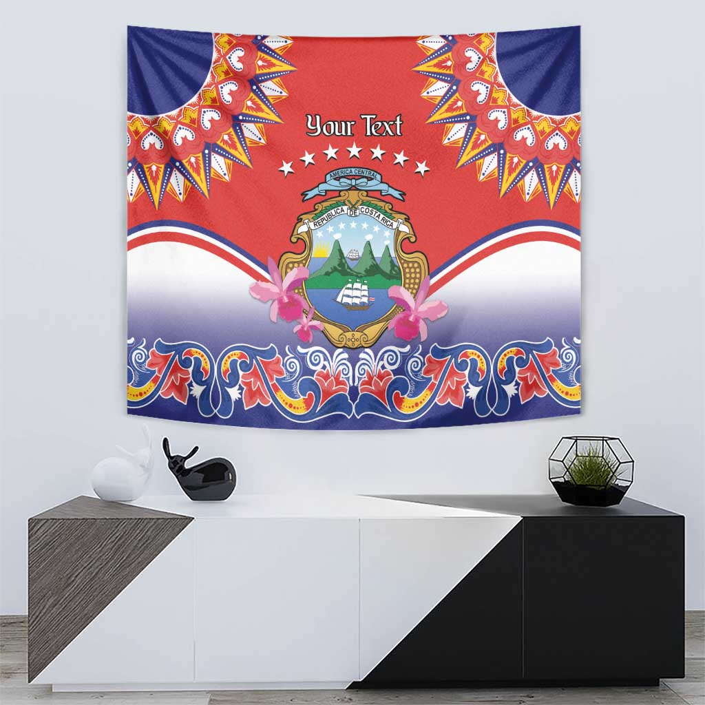 Red and blue folk hanging tapestry with central crest emblem and 'Your Text' banner.