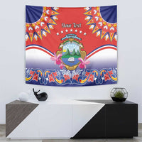 Red and blue folk hanging tapestry with central crest emblem and 'Your Text' banner.