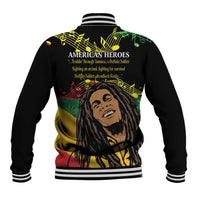 Black baseball jacket with striped ribbed hem and back graphic text and face illustration