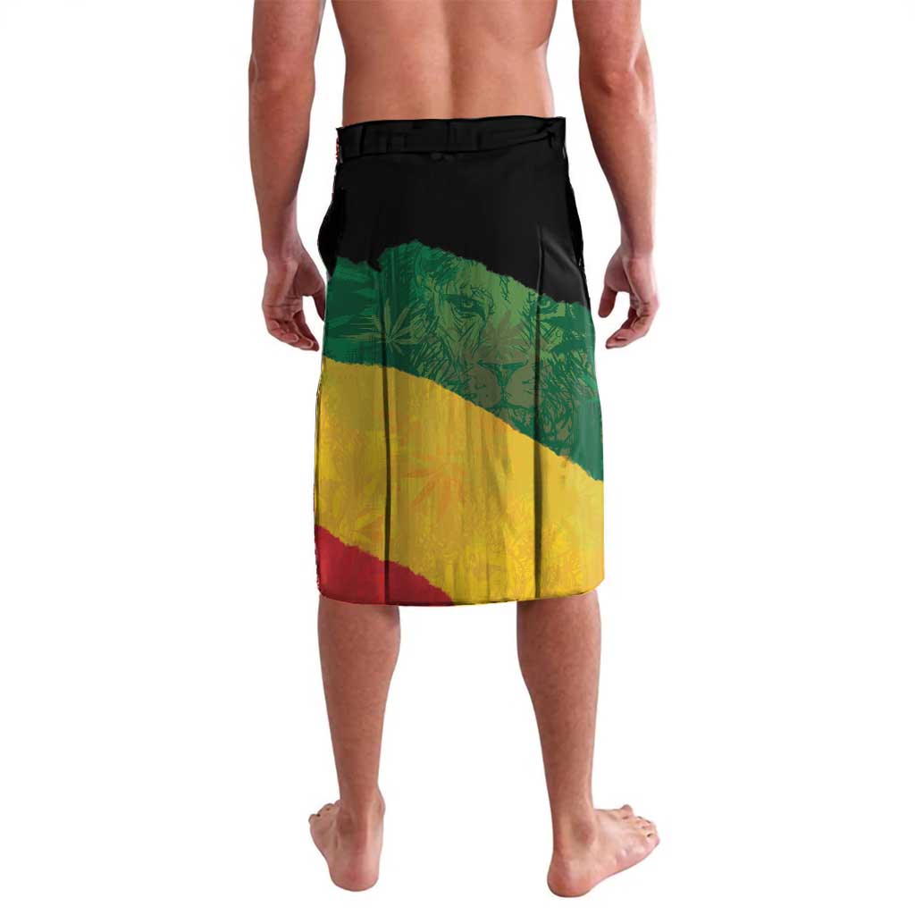 Black board shorts with green, yellow, red reggae flag-style panel