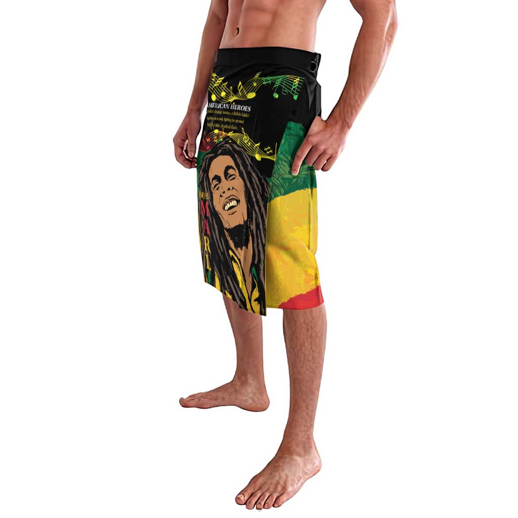 Black graphic board shorts with smiling portrait artwork and colorful side panels
