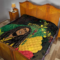Black quilt blanket on a wooden bed, featuring Buffalo Soldier portrait and green/yellow/red sections.