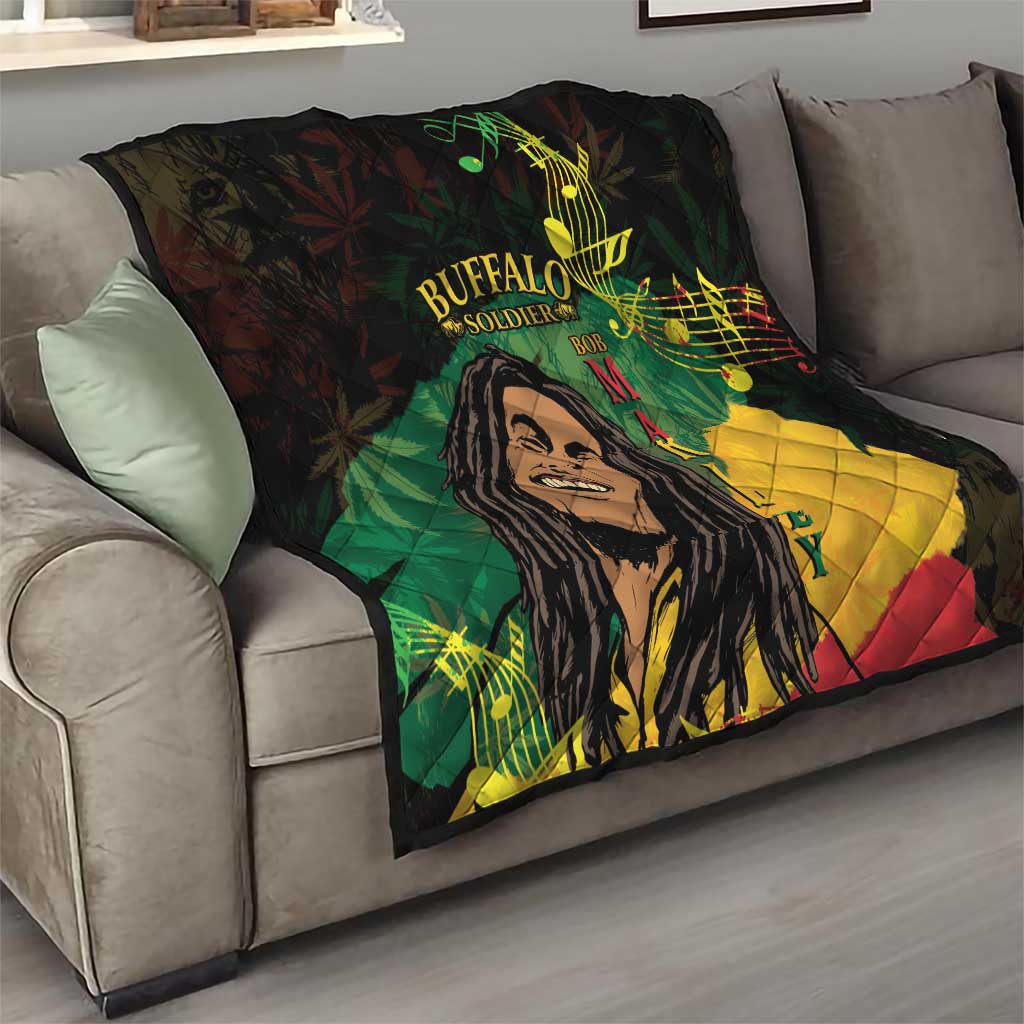 Black quilt blanket draped on a couch, with Buffalo Soldier portrait and multicolor note details.