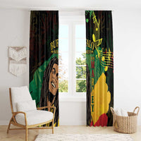 Black window curtain panels with reggae artwork portrait, green-yellow-red colors, music notes.