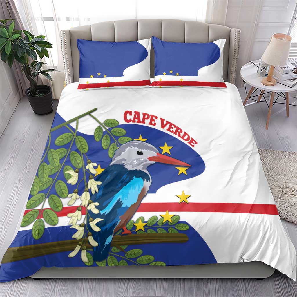 Cape Verde bedding set on bed: blue flag, red stripe, bird illustration with two matching pillows