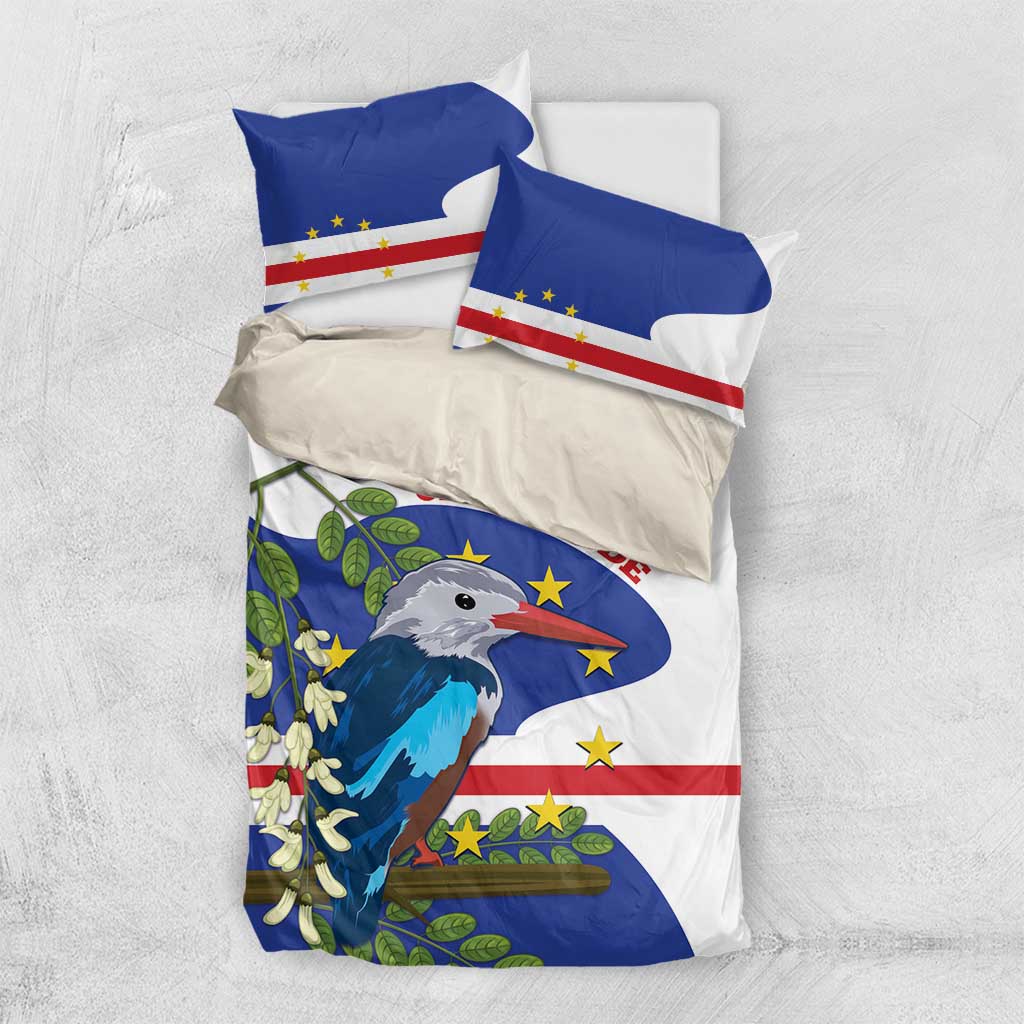 Cape Verde bedding set, folded duvet and pillows with bird graphic on blue and white flag