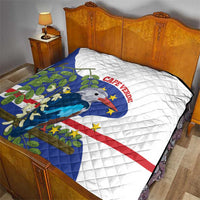 Quilted bed throw with Cape Verde bird and flag print on white fabric
