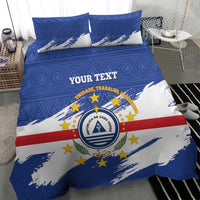 Blue patterned duvet bedding set with 'YOUR TEXT' and Cape Verde coat of arms, two pillows