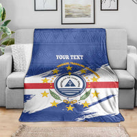 Cape Verde flag blanket with blue geometric top, white field, red stripe, round crest