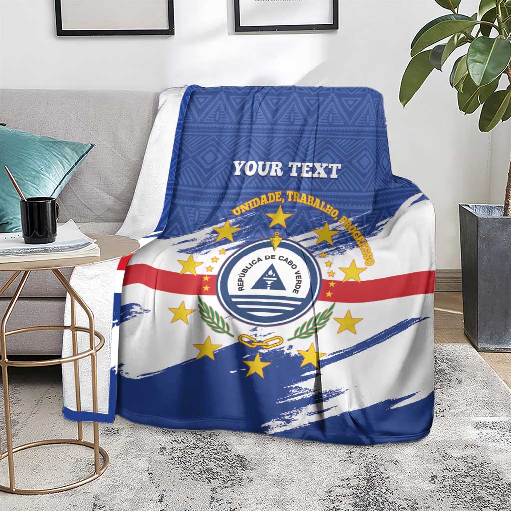 Cape Verde flag blanket with blue geometric texture, white and red stripes, circular emblem