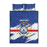 Blue quilt bed set with flag crest center and geometric quilting, includes 2 pillows