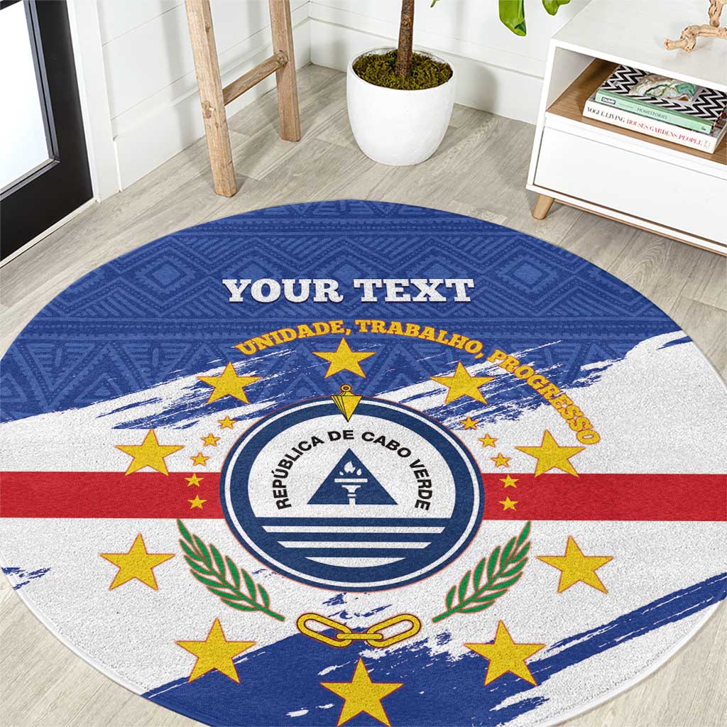 Blue round rug with Cape Verde coat of arms, stars and stripes, personalized text band
