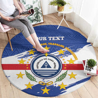 Blue round rug featuring Cape Verde coat of arms, stars, and flag-style stripes