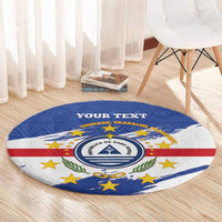 Blue round rug with Cape Verde coat of arms emblem, stars and stripes, centered