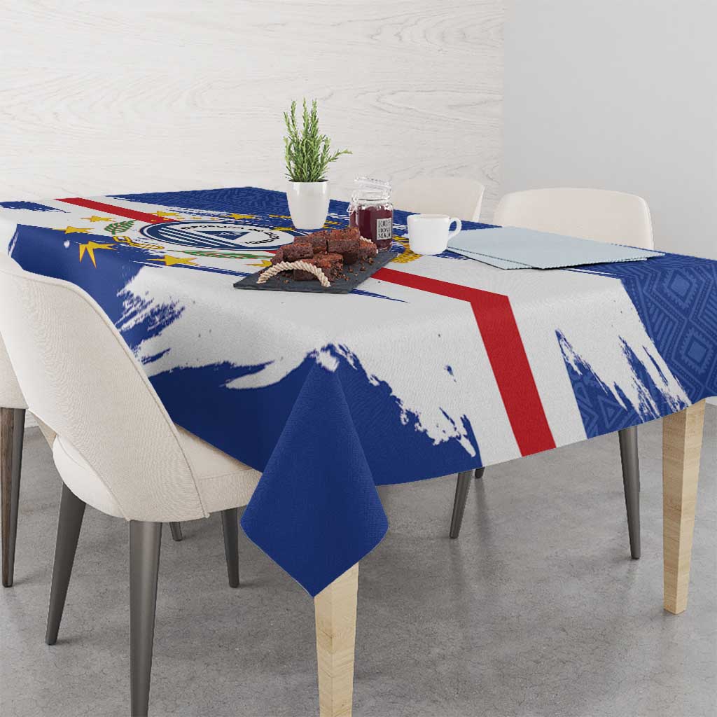 Personalized Cape Verde tablecloth on dining table with blue, white, and red stripe design