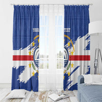 Blue Cape Verde coat of arms curtain panels with stars, red stripe, and white diagonal brush accents.
