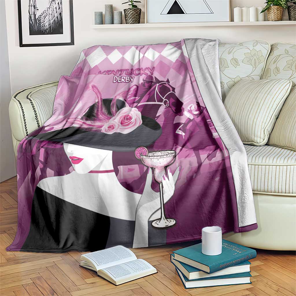 Pink pastel derby blanket over couch, woman and horse artwork with Kentucky Derby text