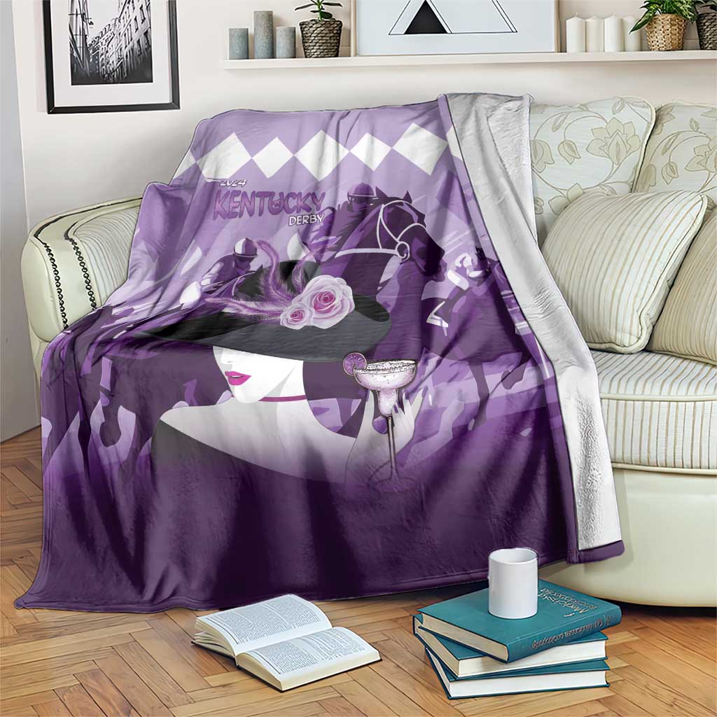 Purple derby-themed blanket with white diamond pattern and horse rider graphic