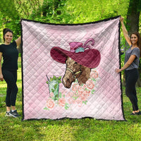 Pink quilt spread on grass, horse head with big hat and roses bouquet print
