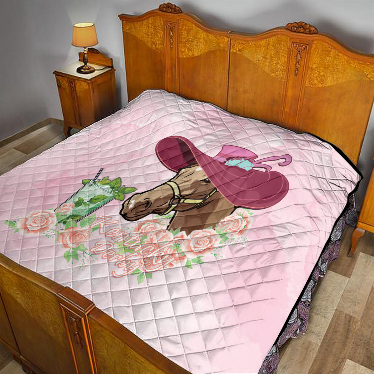 Pink quilt on bed, horse head graphic with roses and decorative hat